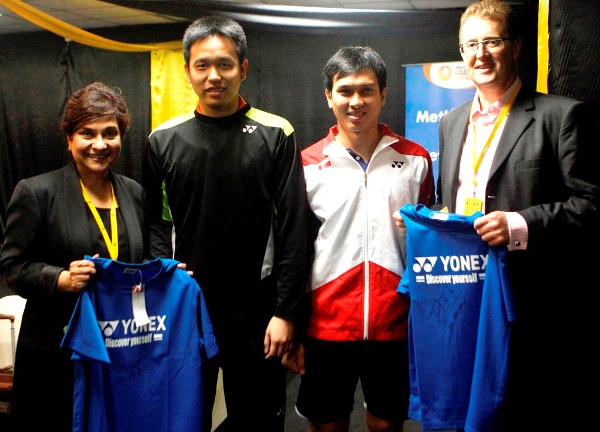 HAPPY TO MEET YOU: Men’s doubles world champions, Mohammad Ahsan (second right) and Hendra Setiawan (second left) of Indonesia presented autographed shirts to MetLife’s President for the Asia region, Chris Townsend and ?Head of Designated Markets and Health Asia, MetLife Asia Pacific Ltd., Nirmala Menon (left).