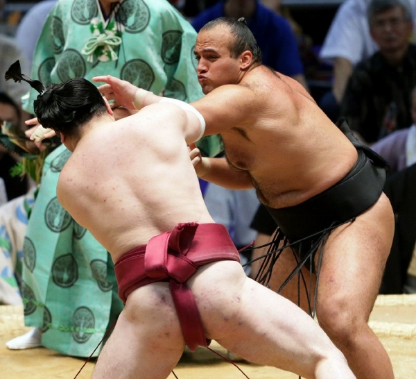 'Osunaarashi' (right) in action against Japanese wrestler Oniarashi in Nagoya, July last year. The Arab world's first professional sumo wrestler says he wants to make the sport famous among 'his people'. AFPpic