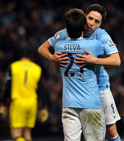 Man City celebrate their second goal against Spurs/AFP pic.