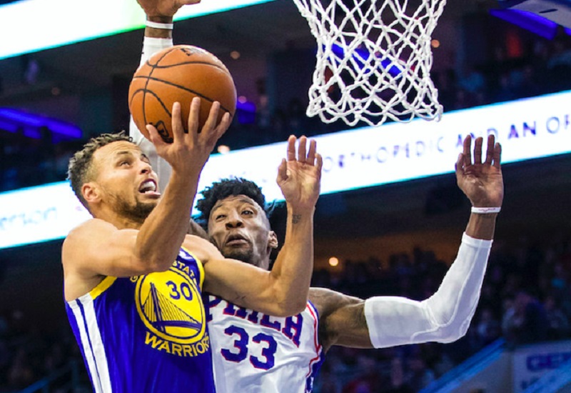 Curry leads Warriors fightback after Sixers blitz
