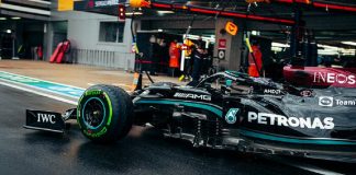 Hamilton takes 100th F1 victory after late rain shower
